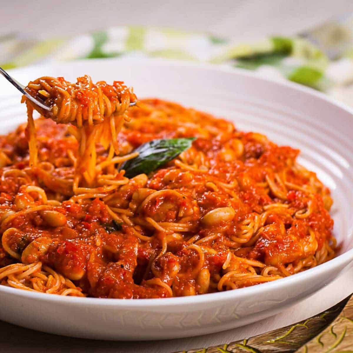 A Sweet And Spicy Red Pasta Sauce With Creamy Cannellini Beans