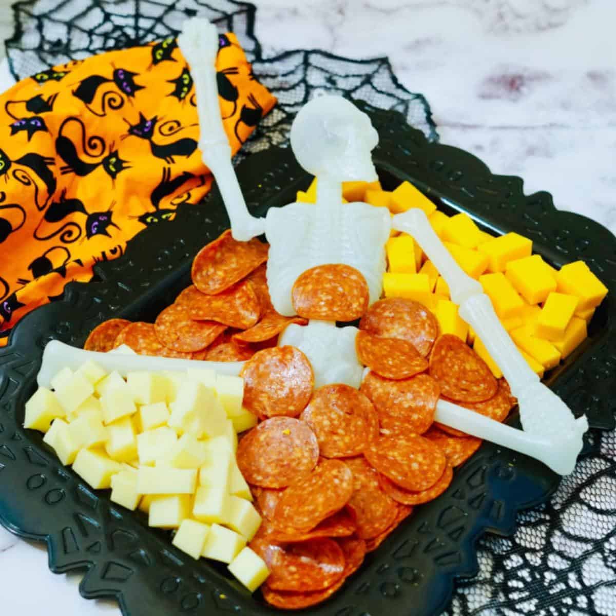 10-minute Dollar Tree Skeleton Charcuterie Board for Halloween 10-minute Dollar Tree Skeleton Charcuterie Board for Halloween
