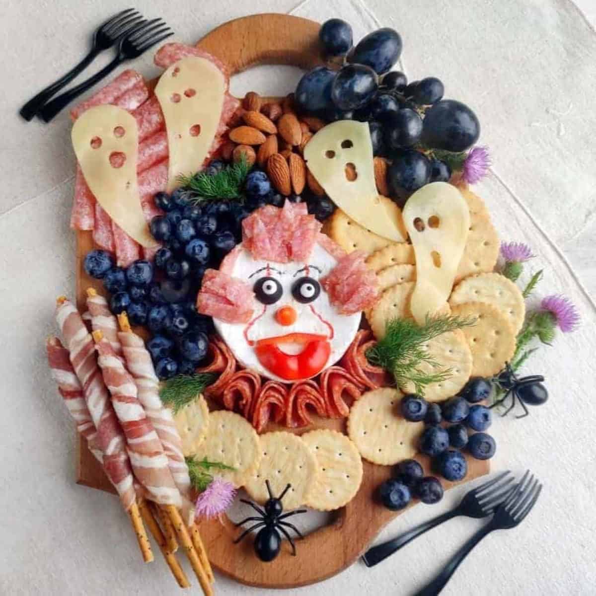 Scare up Some Snacks with a Halloween Pennywise Charcuterie Board Scare up Some Snacks with a Halloween Pennywise Charcuterie Board